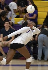 Lemoore's Jayda English goes for a save in Tuesday's exciting victory over Golden West.